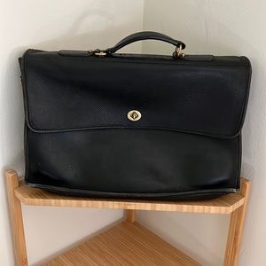 Beautiful black leather briefcase. Very high quality.
